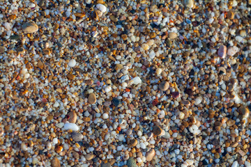 sea pebbles colored granite on the beach
