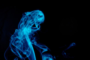 Obraz premium Blue abstract smoke on black background