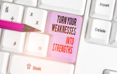 Handwriting text writing Turn Your Weaknesses Into Strengths. Conceptual photo work on your defects...