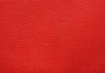 red nonwoven polypropylene fabric texture background