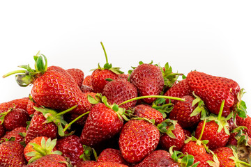 Pile of fresh strawberries on white