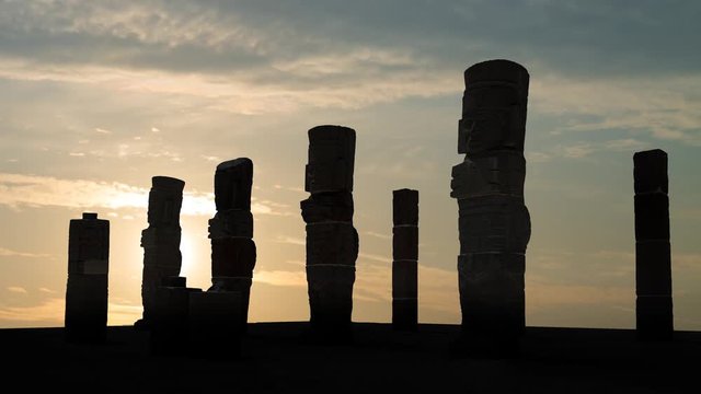 Toltec Atlantes: Warriors Sculptures, Time Lapse at Sunrise of Atlantean Columns on top Pyramid of Quetzalcoatl, Tula de Allende, Mexico. UNESCO world heritage site