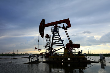 in the evening, oil pumps are running