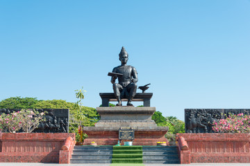 Fototapeta na wymiar Sukhothai, Thailand - Apr 08 2018: Monument of King Ramkhamhaeng The Great in Sukhothai Historical Park, Sukhothai, Thailand.