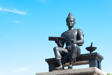Fototapeta na wymiar Sukhothai, Thailand - Apr 08 2018: Monument of King Ramkhamhaeng The Great in Sukhothai Historical Park, Sukhothai, Thailand.