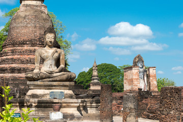 Fototapeta na wymiar Sukhothai, Thailand - Apr 08 2018: Wat Mahathat in Sukhothai Historical Park, Sukhothai, Thailand. It is part of the World Heritage Site - Historic Town of Sukhothai and Associated Historic Towns.
