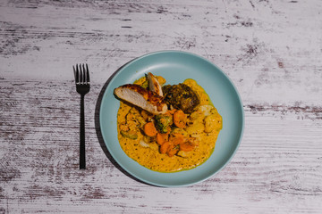 healthy vegan recipes broccoli carrots and potato dish with curry