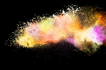 Explosion of colored powder isolated on black background. Abstract colored background. holi festival.