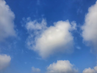 Fototapeta premium cloud floating in blue sky with copy space.Water droplets and ice crystals gathered together into clumps. Floating in the azure atmosphere