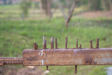 Close up iron bender in construction site