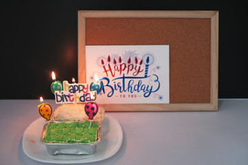 Light up Happy Birthday cakes on wooden frame