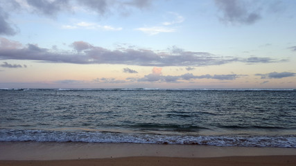 Sandy shoreline of Kahala Beach and Pacific Ocean