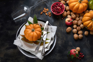 Autumn table setting with pumpkins