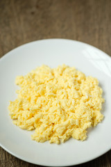 Scramble on a white plate with copy space