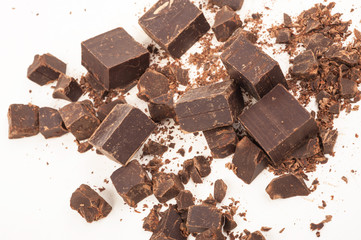 Broken chocolate on white background