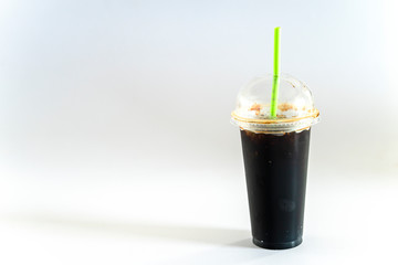 Coffee in ready-to-eat plastic cups on a white background