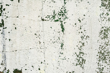 Texture of a concrete wall with cracks and scratches which can be used as a background