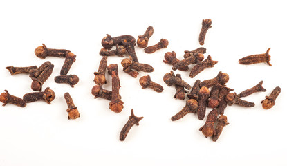 dry cloves on white background