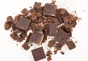 Broken chocolate on white background