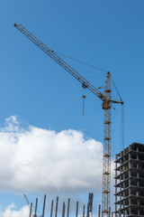 building under construction. construction cranes at a construction site