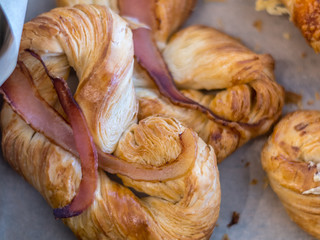 Isolated close up of fresh delicious pastry and ham