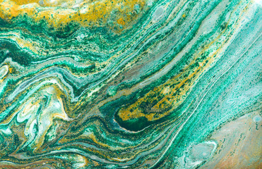 Obraz premium Green and gold ripples abstract background.