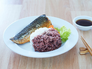 Japanese Food. Mackerel grilled with rice on plate