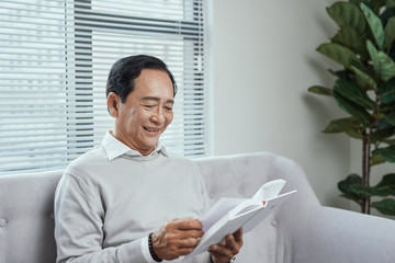 Senior Man Reading a Book