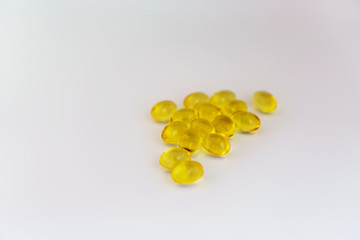 Sesame oil extracted capsules isolated on white background