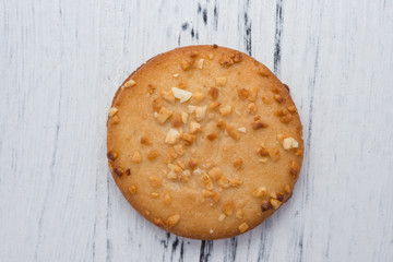 crispy crackers with peanut on blue table