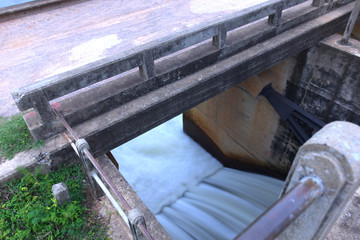 high speed flowing water . Excess water during spring flood, dropping from reservoir. 