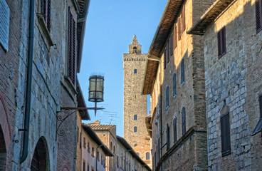 Fototapeta na wymiar Alley in the medieval town of San Gimignano - Tuscany Italy