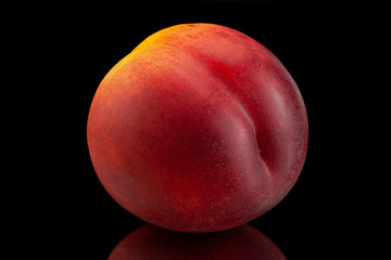Ripe nectarine fruit on black