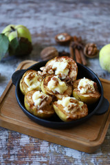 Baked quince with cinnamon and sweet cheese. Healthy autumn dessert. Keto dessert.