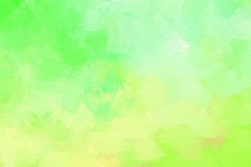 abstract grunge brush painted artwork with pale green, tea green and pastel yellow color. can be used as texture, graphic element or wallpaper background