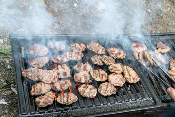 Grilling meatballs on the grill