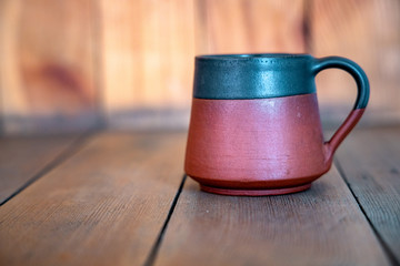 a cup of tea placed on a wooden table