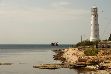 Obraz premium Chersonesus lighthouse is an active lighthouse on Cape Chersonesus of the Crimean Peninsula. Administratively belongs to the city of Sevastopol and is located in its westernmost point