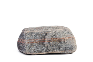 Big gray pebble stone with light brown strips isolated on a white background. Side view