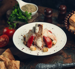 Chicken breast sliced chicken breast with ground cheese and tomatoes
