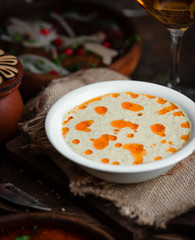 Creamy soup with oil topping