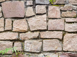 Light brown stone wall texture. Square shape stones.