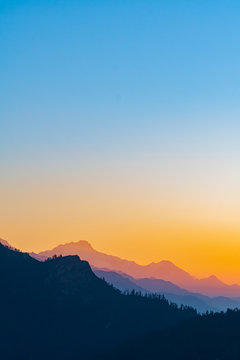 Fototapeta Beautiful sunrise background, Silhouette mountain style