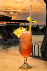 Ice tea with ice and slice of ananas