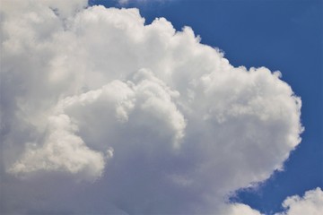 White Fluffy Cloud on Blue Sky