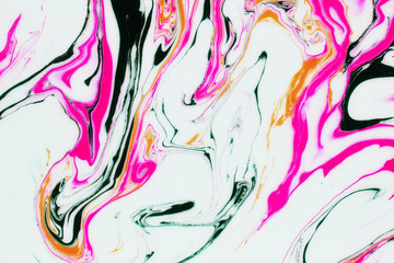 Abstract painting technique Ebru .Turkish style Ebru on the water with acrylic paints press waves.Modern art marble liquid texture