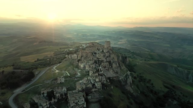 Aerial view of the abandoned town of Craco, Basilicata region, Italy, shot during sunset