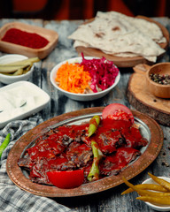 Roasted meat slices with green pepper and topped with ketchup 3