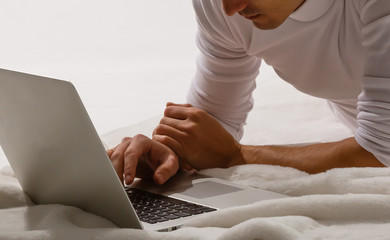Man working on his laptop at home