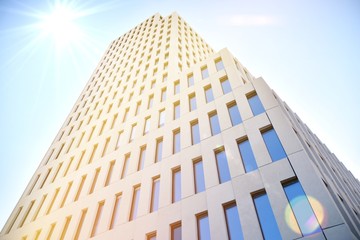Modern office building detail. Perspective view of geometric angular concrete windows on the facade...